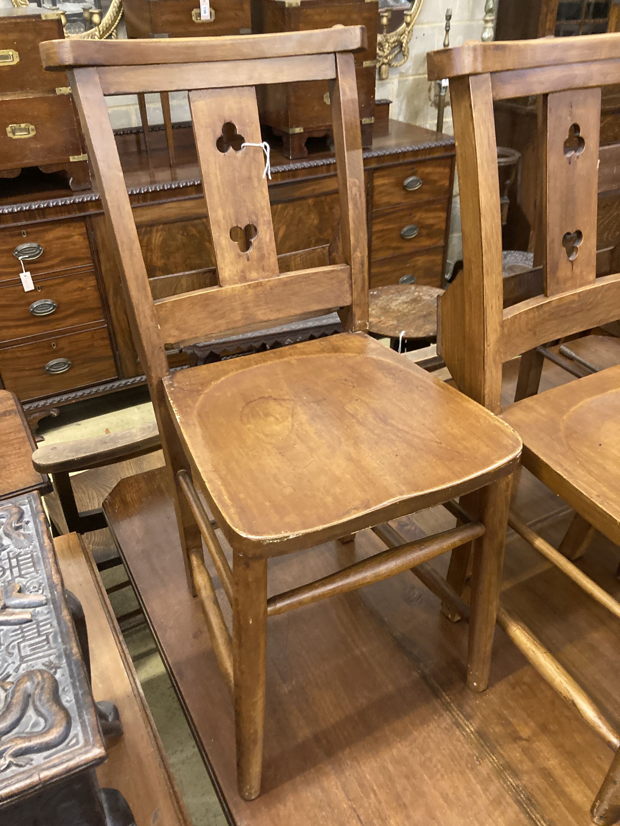 Seven Victorian elm and beech chapel chairs